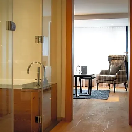 ホテル Walliserhof Grand-hotel & Relais & Chateaux 5*
